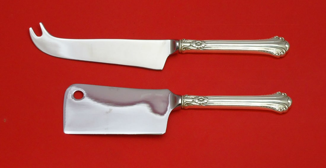 Towle Sterling Silver Cheese Serving Set 2PC Custom Hollow Handle: Towle Sterling Silver Cheese Serving Set 2PC Custom Hollow Handle Indulge in elegance with this stunning 2-piece cheese serving set by Towle, crafted in sterling silver. This exquisite set features a 