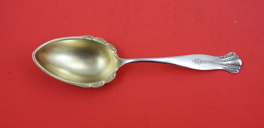Towle Cambridge Sterling Silver Preserve Spoon Gold Wash 7 5/8": Towle Cambridge Sterling Silver Preserve Spoon Gold Wash 7 5/8" This exquisite preserve spoon is part of the Cambridge pattern by Towle, crafted in sterling silver with a beautiful gold wash. Measurin