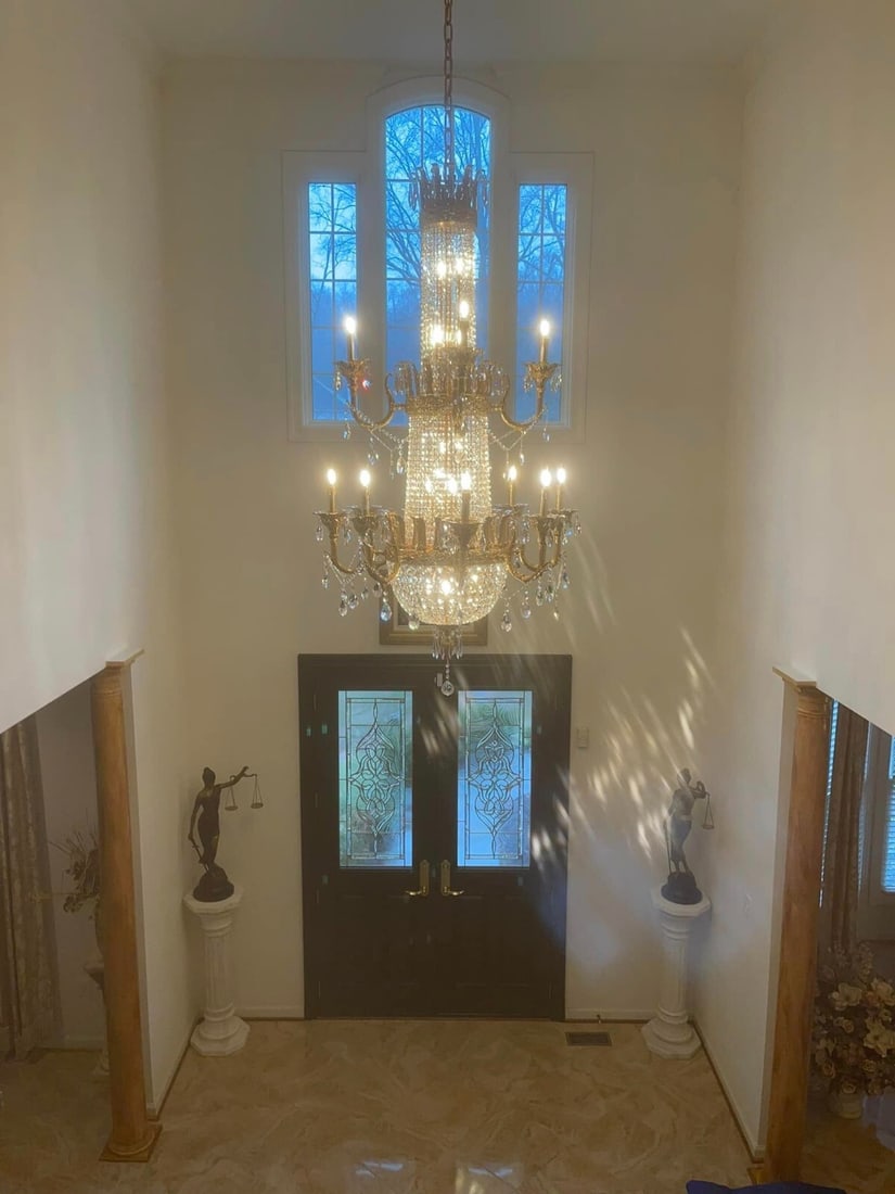 Empire Style 25 Light Asfour Crystal Chandelier 68in x 38in: Empire Style 25 Light Asfour Crystal Chandelier 68in x 38in This Empire style chandelier features 25 lights and is crafted with high-quality Asfour crystals, polished karat gold finish, and a round sh