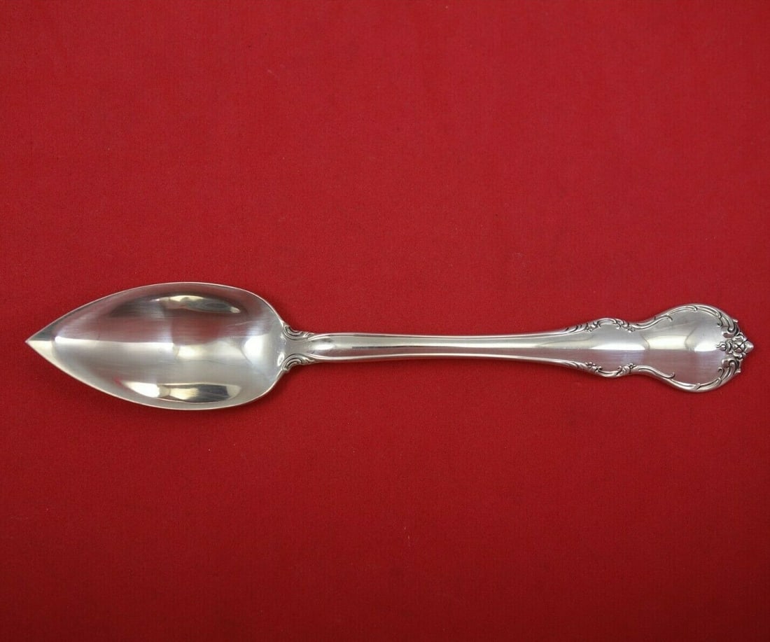 Towle French Provincial Sterling Silver Grapefruit Spoon 5 3/4": Towle French Provincial Sterling Silver Grapefruit Spoon 5 3/4" This exquisite grapefruit spoon from the French Provincial pattern by Towle is a beautiful addition to any table setting. Crafted from h