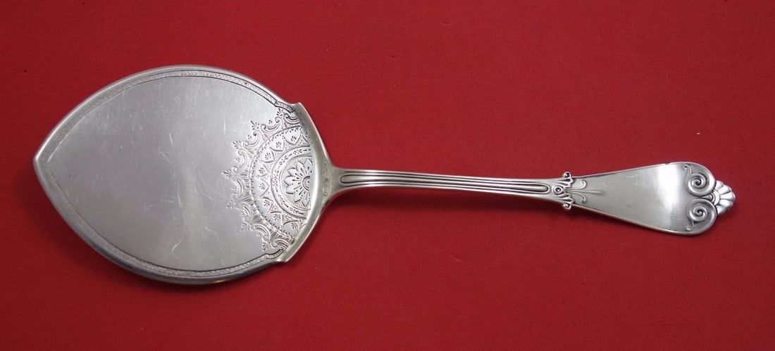 Tiffany & Co Beekman Sterling Silver Buckwheat Server 9 1/4 inches: Tiffany & Co Beekman Sterling Silver Buckwheat Server 9 1/4 inches Experience the elegance of the Beekman pattern by Tiffany & Co. This exquisite sterling silver buckwheat server features a bright-cut