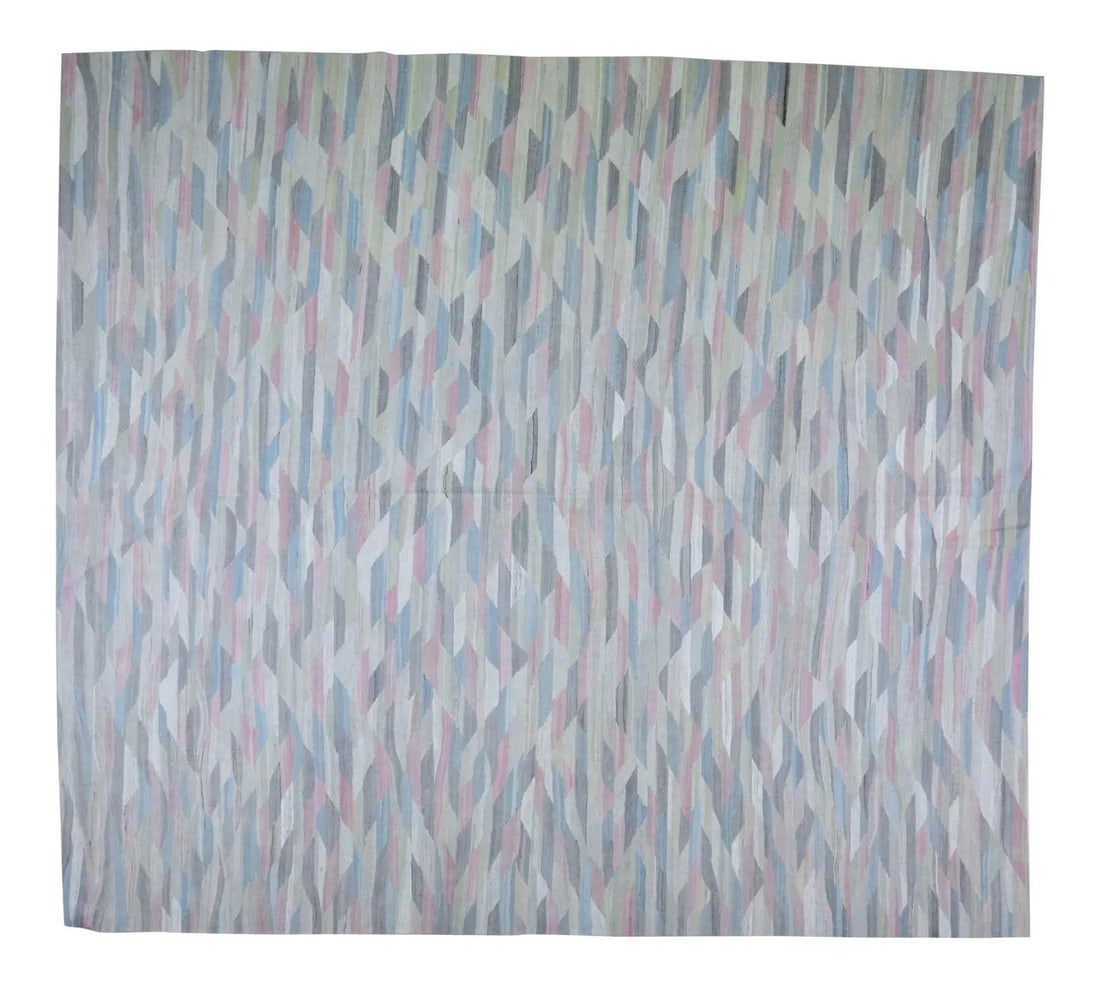 Handwoven Wool Kilim Rug With Geometric Motif 8'6 x 9'5: Handwoven Wool Kilim Rug With Geometric Motif 8'6 x 9'5 This vintage tribal kilim is hand woven from organic wool and features natural colors with a geometric pattern. The rug showcases traditional cr