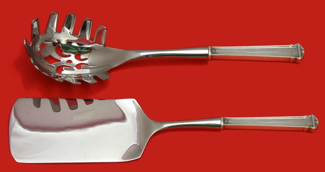 2 Piece Theseum by International Sterling Pasta and Lasagna Server Set: 2 Piece Theseum by International Sterling Pasta and Lasagna Server Set Custom-made two-piece Italian serving set by International Sterling in the Theseum pattern. The set features sterling silver holl