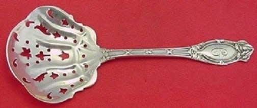 International Sterling Silver Abbottsford Nut Spoon 5 1/4 Inch Slotted: International Sterling Silver Abbottsford Nut Spoon 5 1/4 Inch Slotted This exquisite nut spoon features the Abbottsford pattern by International, crafted from high-quality sterling silver. Measuring 