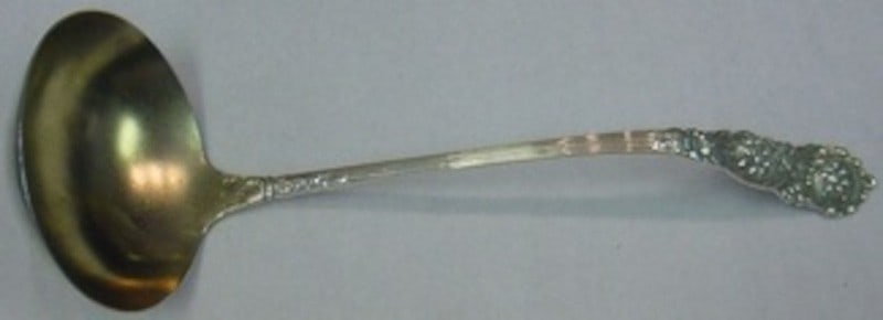 Reed and Barton Trajan Sterling Silver Gold Washed Soup Ladle 12 1/2": Reed and Barton Trajan Sterling Silver Gold Washed Soup Ladle 12 1/2" Sterling silver soup ladle in the Trajan pattern by Reed & Barton. It features a gold washed finish, is not monogrammed, and is de