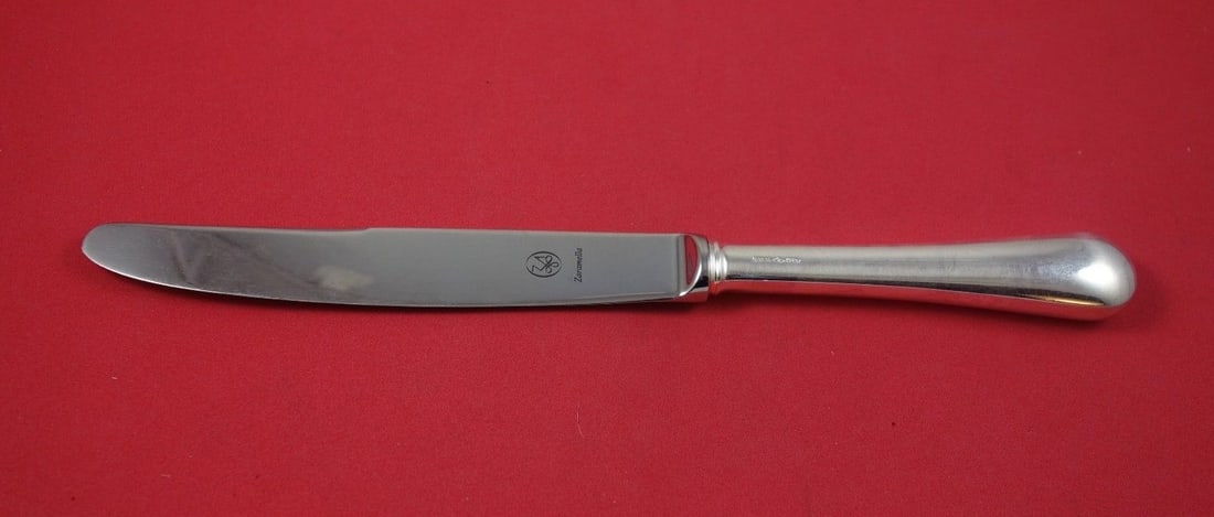Zaramella Argenti Spagnolo Sterling Silver Dinner Knife 9 3/4": Zaramella Argenti Spagnolo Sterling Silver Dinner Knife 9 3/4" This exquisite dinner knife by Zaramella Argenti showcases the elegance of sterling silver craftsmanship. The Spagnolo design features a 