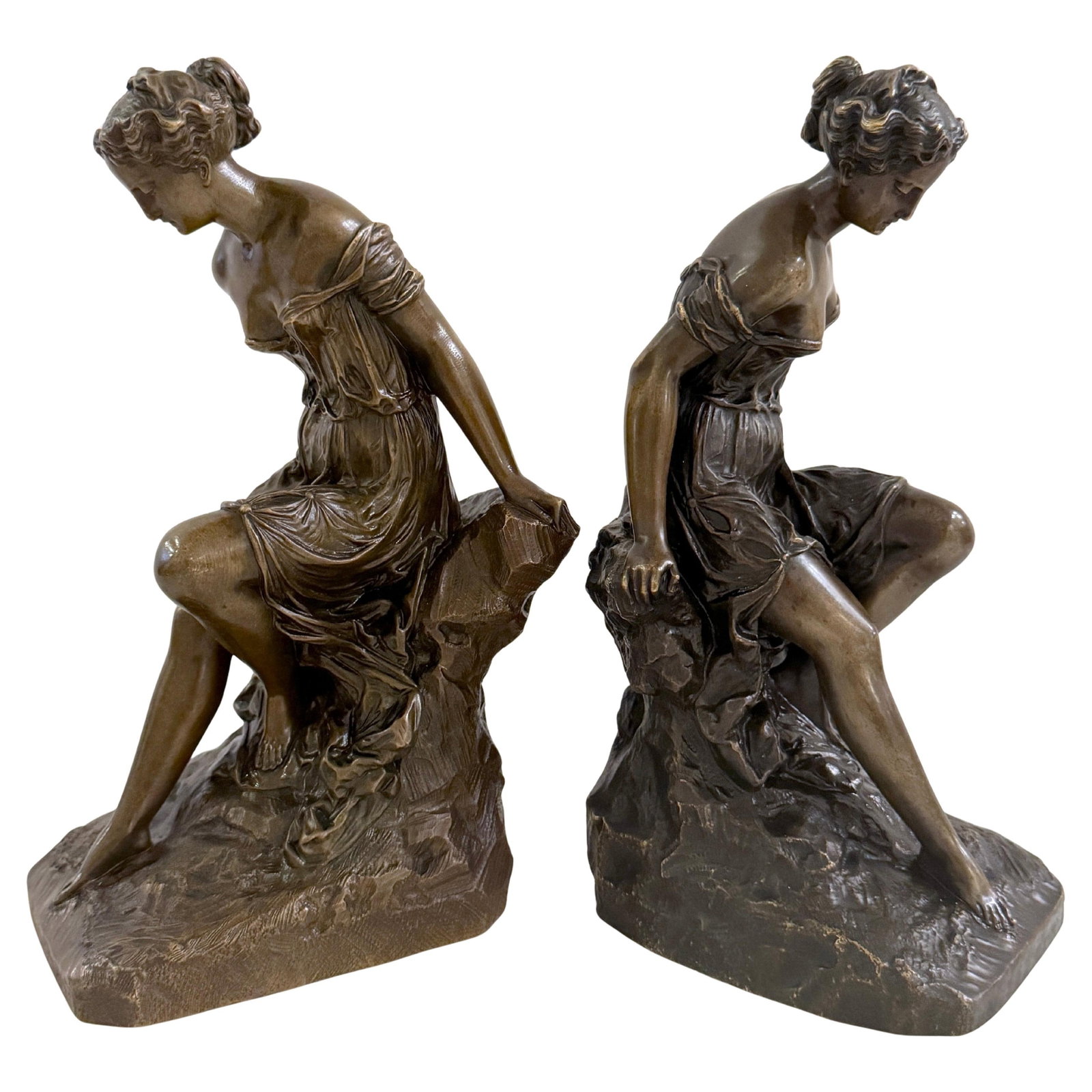 19th Century Bronze Clodion School Bathing Beauty Bookends Set of 2: 19th Century Bronze Clodion School Bathing Beauty Bookends Set of 2 This exquisite pair of 19th-century bronze bookends or sculptures showcases the artistry of the Clodion School, inspired by Claude M