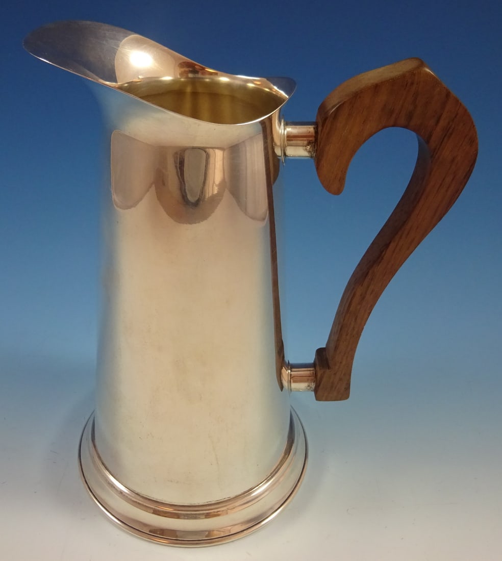 Stieff Sterling Silver Trophy Pitcher Inscribed Wisconsin State Shoot 1964: Stieff Sterling Silver Trophy Pitcher Inscribed Wisconsin State Shoot 1964 This exquisite Stieff sterling silver trophy pitcher is a remarkable collector's piece. It features a charming design and is 