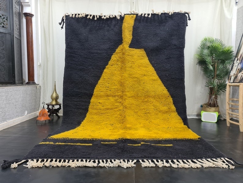 Authentic Handmade Moroccan Berber Black Yellow Wool Rug 9.84 x 6.56 Feet: Authentic Handmade Moroccan Berber Black Yellow Wool Rug 9.84 x 6.56 Feet Discover the beauty of this authentic handmade Black & Yellow Moroccan Berber rug. Skillfully handwoven by local Berber women 