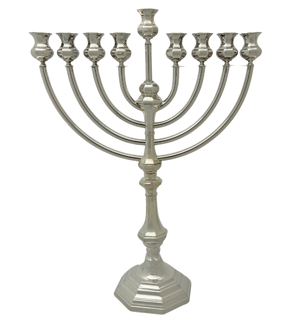 Tiffany & Co 925 Sterling Silver Handmade Hanukkah Menorah: Tiffany & Co 925 Sterling Silver Handmade Hanukkah Menorah This Tiffany & Co. Hanukkah menorah is crafted from 925 sterling silver and showcases a classic modern design with a shiny, sleek finish. Han