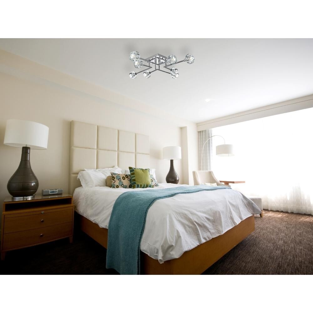 Eren 8-Light Chrome Crystal Flush Mount 31 Inch: Eren 8-Light Chrome Crystal Flush Mount 31 Inch The Eren 31-inch flush mount chandelier features a modern chrome finish and eight lights with faceted crystal glass shades, offering a luxurious and tim
