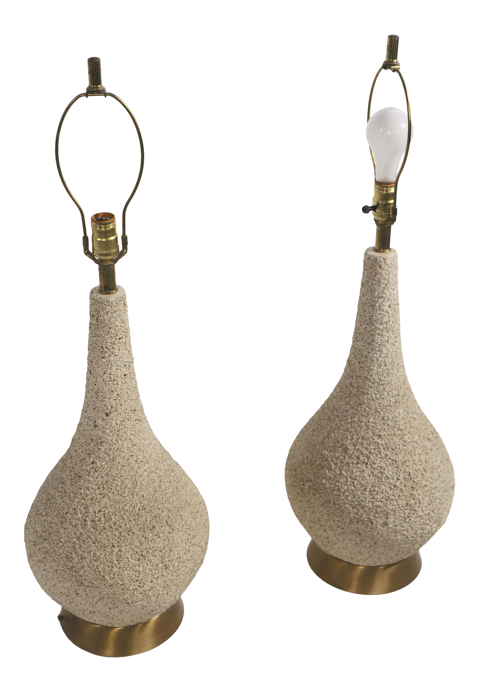 Chic Mid Century Ceramic Table Lamps Pair Brass Base: Chic Mid Century Ceramic Table Lamps Pair Brass Base This stylish pair of Mid Century ceramic table lamps features a unique bulbous design with dimensional textured surfaces, elegantly mounted on bras