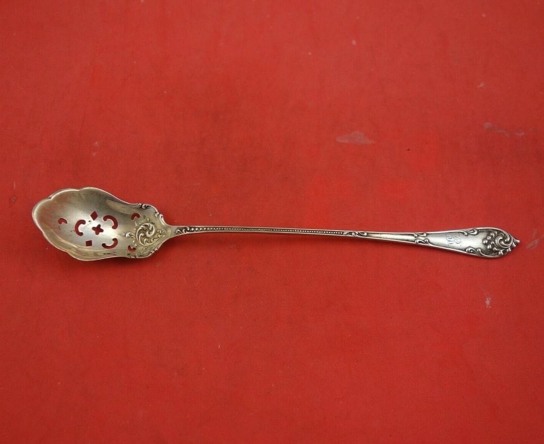 Towle Rustic Sterling Silver Olive Spoon 7 1/4" Gold Washed Pierced: Towle Rustic Sterling Silver Olive Spoon 7 1/4" Gold Washed Pierced This exquisite Rustic by Towle serving spoon is crafted from sterling silver, showcasing a beautiful pierced design. Measuring 7 1/4