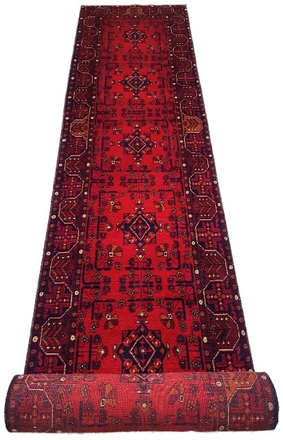 Vibrant 16' x 3' Red Khal Momadi Area Rug: Vibrant 16' x 3' Red Khal Momadi Area Rug Free continental US Shipping This stunning 16' x 3' Red Khal Momadi Rug is a perfect addition to any space, offering both style and comfort. Its vibrant red c