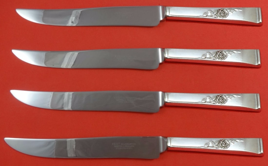 Reed and Barton Classic Rose Sterling Silver Steak Knives 4pc Texas Sized: Reed and Barton Classic Rose Sterling Silver Steak Knives 4pc Texas Sized Introducing the Classic Rose Steak Knife Set by Reed and Barton, a stunning 4-piece collection designed for those who apprecia