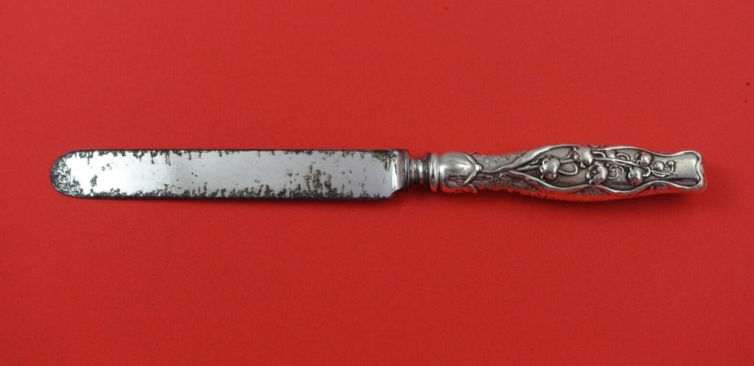 Whiting Lily of the Valley Sterling Silver Tea Knife 7 3/4": Whiting Lily of the Valley Sterling Silver Tea Knife 7 3/4" This exquisite tea knife features the beautiful "Lily of the Valley" pattern by Whiting. Crafted from sterling silver, it boasts a hollow ha