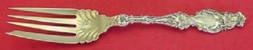 Whiting Lily Sterling Silver Gold Wash Cold Meat Fork 7 5/8": Whiting Lily Sterling Silver Gold Wash Cold Meat Fork 7 5/8" Elevate your dining experience with this exquisite Lily by Whiting Sterling Silver Cold Meat Fork. Crafted between 1900 and 1940, this serv