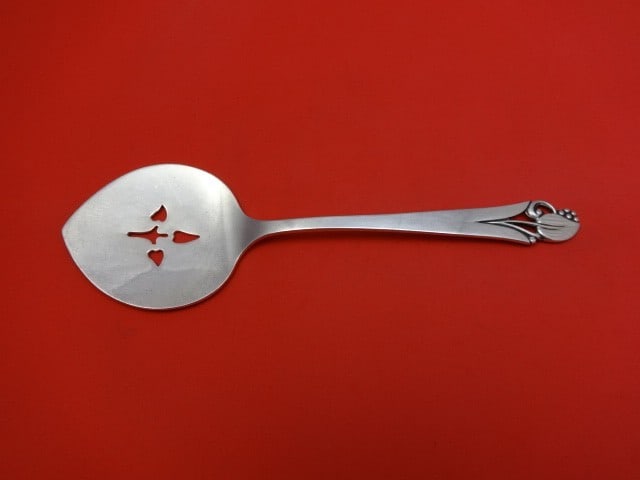 Frank Smith Woodlily Sterling Silver 8 Inch Tomato Server: Frank Smith Woodlily Sterling Silver 8 Inch Tomato Server Crafted in the exquisite Woodlily pattern by Frank Smith, this sterling silver tomato server measures 8 inches in length. This pierced server 
