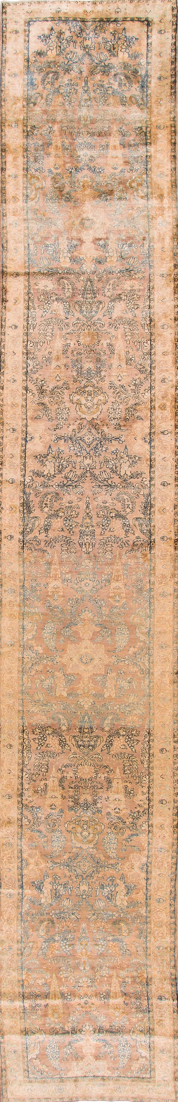 Antique Persian Kerman Wool Runner 2'9 x 20'5 Circa 1905: Antique Persian Kerman Wool Runner 2'9 x 20'5 Circa 1905 This exquisite early 20th-century antique Persian Kerman wool runner showcases a beautiful hand-knotted construction. The rug features a light 