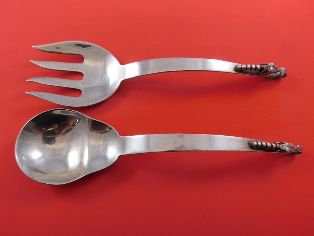 Ramirez Blossom Sterling Silver Salad Serving Set 2-Piece 10 1/4": Ramirez Blossom Sterling Silver Salad Serving Set 2-Piece 10 1/4" Elevate your dining experience with this exquisite 2-piece salad serving set from the renowned Ramirez brand. Crafted from high-qualit