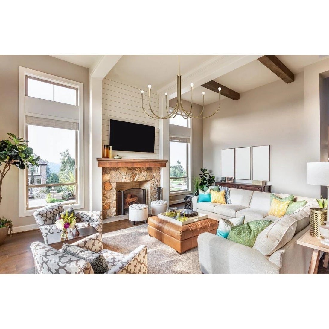 Living District 6-Light Goldish Satin Gold Chandelier 50 Inch: Living District 6-Light Goldish Satin Gold Chandelier 50 Inch This modern farmhouse-style chandelier features a large, round frame in a goldish/satin gold finish, crafted from iron and steel. Measurin