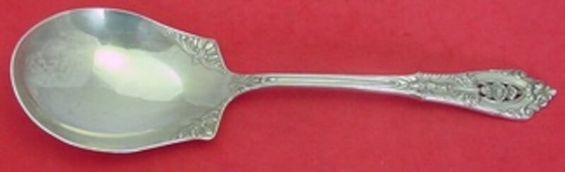 Wallace Rose Point Sterling Silver 9" Berry Serving Spoon: Wallace Rose Point Sterling Silver 9" Berry Serving Spoon This exquisite serving spoon, crafted by Wallace, showcases the elegant Rose Point pattern, a hallmark of fine craftsmanship. Made entirely of