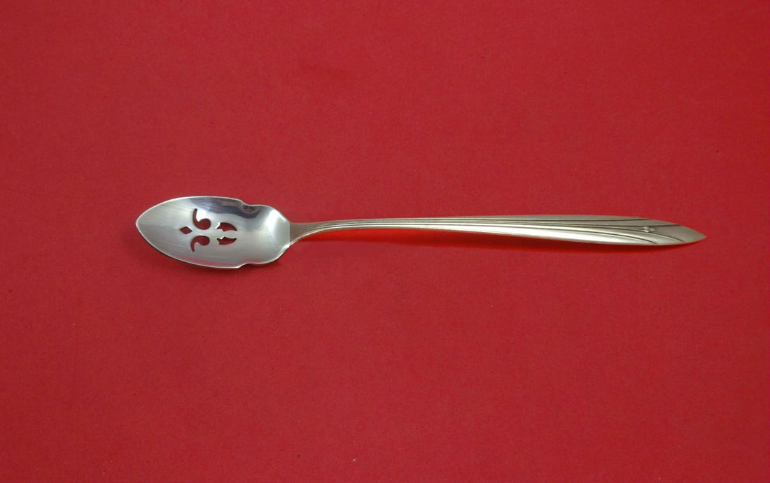 International Sterling Silver Elsinore Olive Spoon 7.5 Inch Pierced Custom: International Sterling Silver Elsinore Olive Spoon 7.5 Inch Pierced Custom Introducing the Elsinore Olive Spoon, a beautifully crafted serving piece by International Sterling. This long, pierced spoon