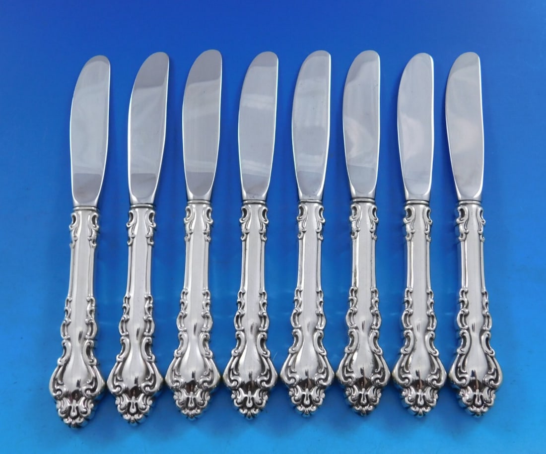 Reed & Barton Spanish Baroque Sterling Silver Butter Spreader Set 8 pcs: Reed & Barton Spanish Baroque Sterling Silver Butter Spreader Set 8 pcs Elevate your dining experience with this exquisite set of 8 butter spreaders from the renowned Reed & Barton, featuring the eleg