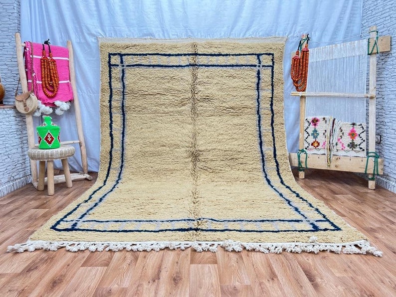 Handwoven Moroccan Rug 100% Sheep Wool 8 x 5 Feet: Handwoven Moroccan Rug 100% Sheep Wool 8 x 5 Feet Enhance your living space with this stunning and elegant soft rug, handwoven in the Atlas Mountains by skilled local Berber women weavers. Crafted usi