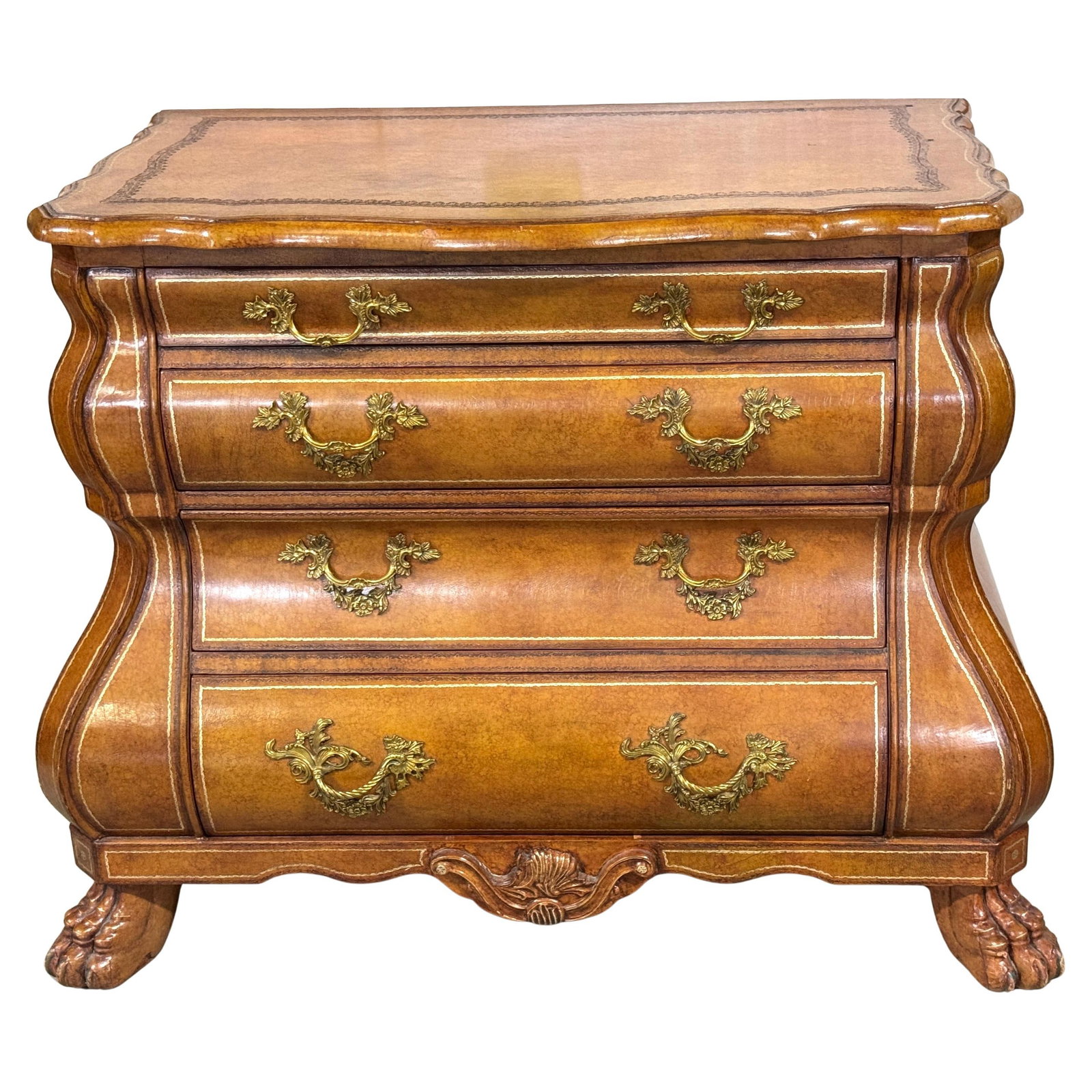 Maitland Smith Neoclassical Gilt Leather Bombe Chest: Maitland Smith Neoclassical Gilt Leather Bombe Chest This stunning gilt and tooled leather Neoclassical bombe chest showcases exceptional craftsmanship and timeless design. Its gracefully curved bombe