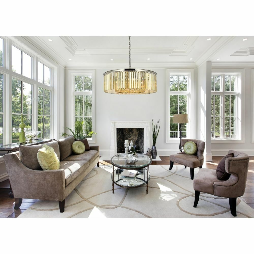 Sydney 10 Light Crystal Chandelier Polished Nickel 43.5 in: Sydney 10 Light Crystal Chandelier Polished Nickel 43.5 in Modern 10-light chandelier with a polished nickel finish and golden teak crystal accents. The fixture is described as frame and crystals only