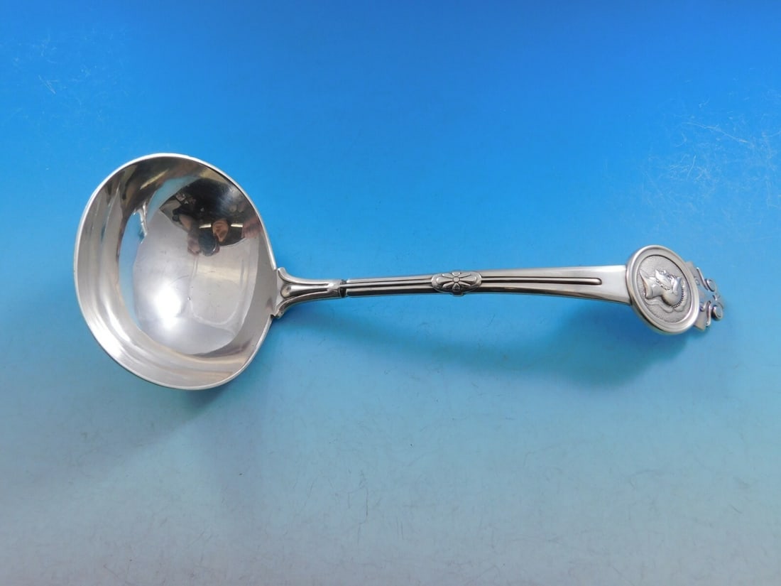 Gorham Medallion Sterling Silver Gravy Ladle 7.25 Vintage Serving Piece: Gorham Medallion Sterling Silver Gravy Ladle 7.25 Vintage Serving Piece This vintage gravy ladle from Gorham, crafted in sterling silver, showcases the intricate Medallion pattern. Measuring 7 1/4" in
