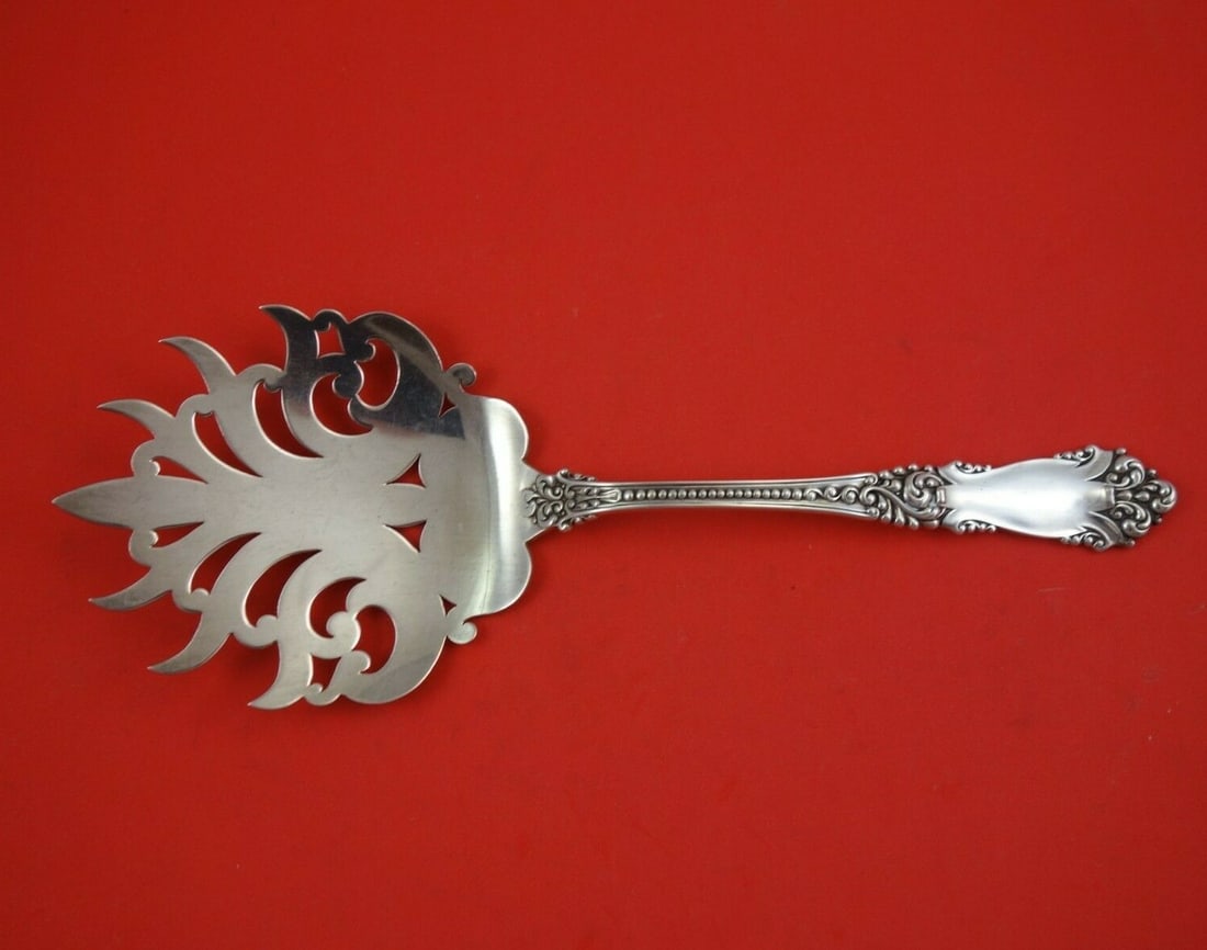 Reed and Barton La Marquise Sterling Silver Macaroni Server 9 5/8": Reed and Barton La Marquise Sterling Silver Macaroni Server 9 5/8" Experience the elegance of the La Marquise pattern with this exquisite 9 5/8" macaroni server from Reed and Barton. Crafted from high
