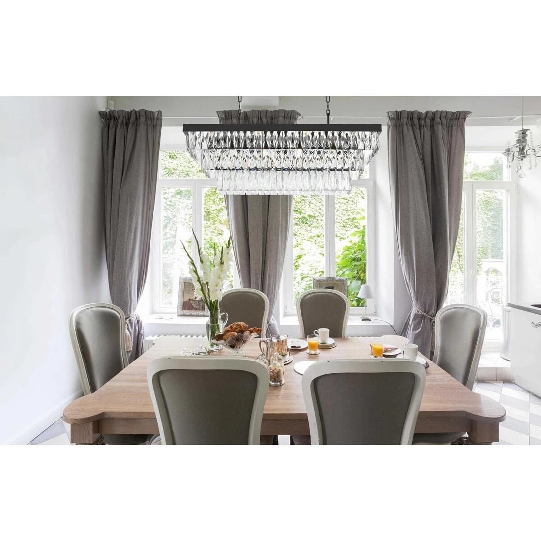 Black Crystal Glass 12 Light Josephine Chandelier 36 Inch: Black Crystal Glass 12 Light Josephine Chandelier 36 Inch This modern chandelier from the Josephine Collection features a sleek black finish and royal cut clear crystal accents. Designed for indoor us
