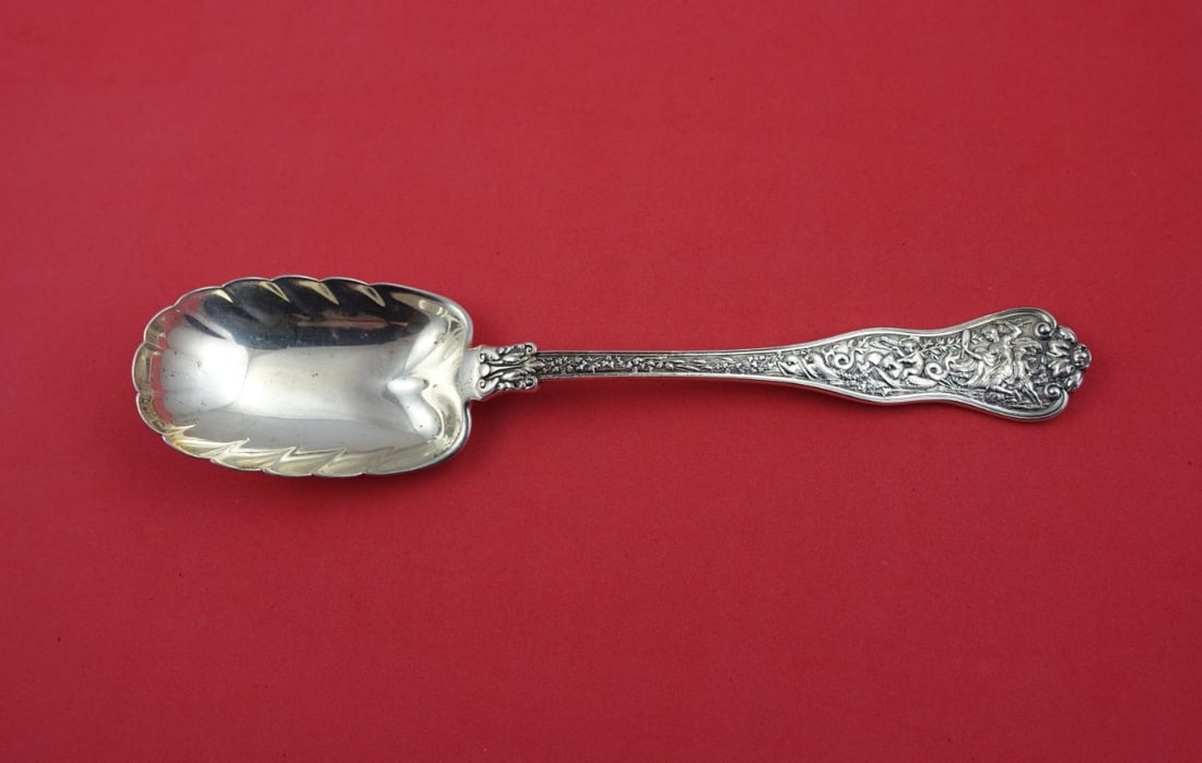 Tiffany & Co Olympian Sterling Silver Berry Spoon Leaf Bowl 8 3/4: Tiffany & Co Olympian Sterling Silver Berry Spoon Leaf Bowl 8 3/4 This exquisite serving spoon from Tiffany & Co. features the intricate Olympian pattern, introduced in 1878. The spoon is crafted from