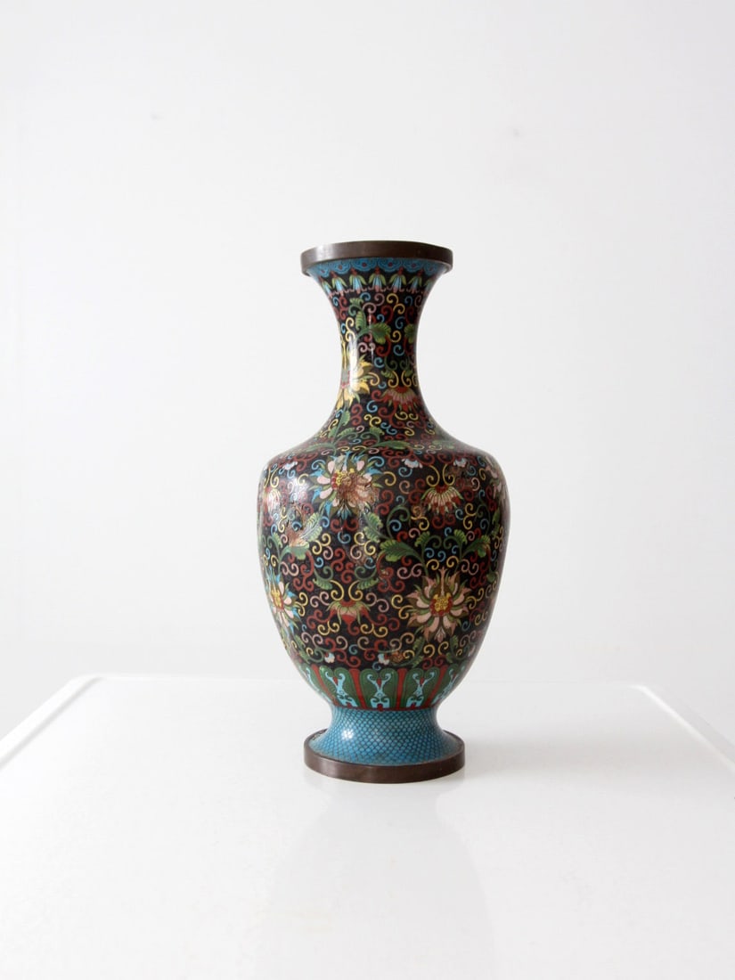 Chinese Cloisonne Enamel Vessel with Lotus Motif 16 inch: Chinese Cloisonne Enamel Vessel with Lotus Motif 16 inch An antique Chinese cloisonne decorative vessel featuring colorful lotus blossoms and scrolling vines on a black ground. Turquoise enamel border