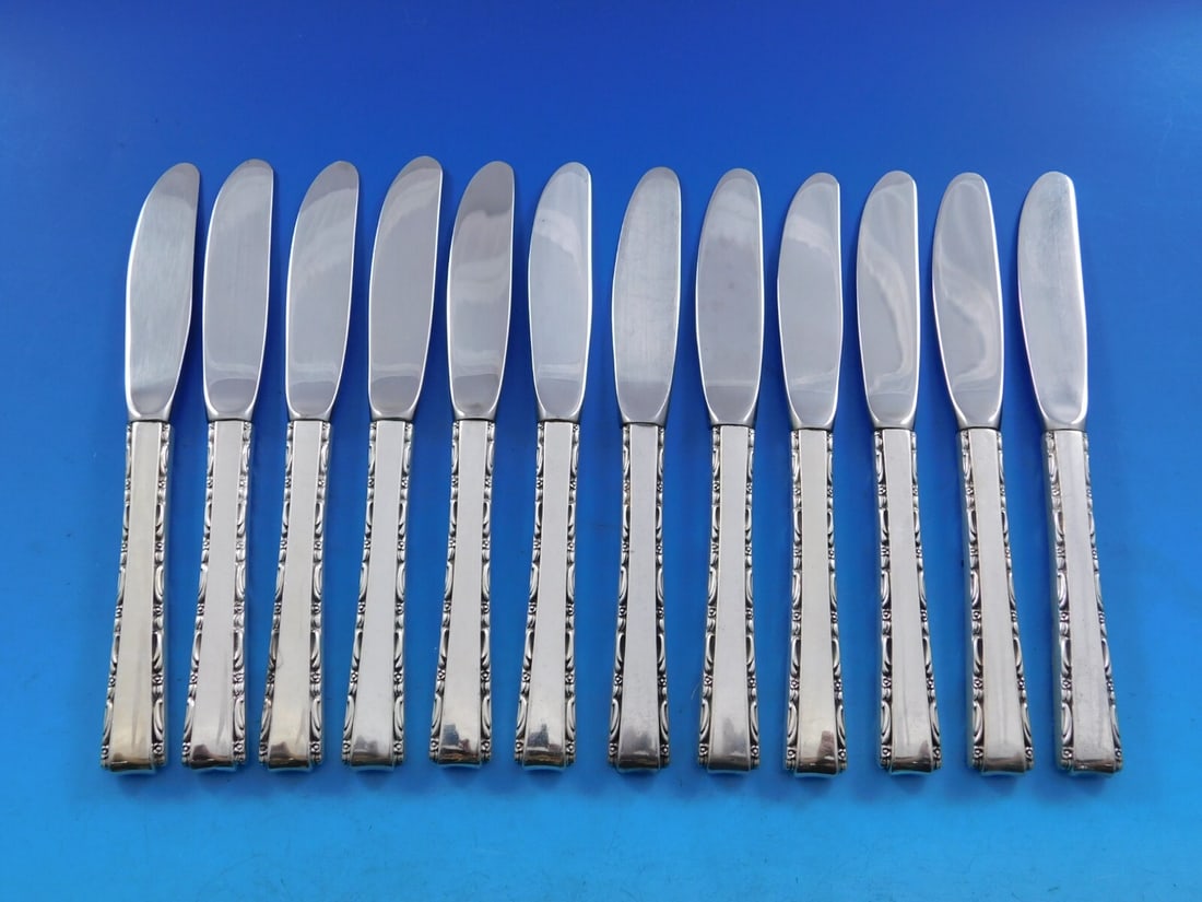 Lunt Madrigal Sterling Silver Butter Spreader Set of 12 Modern 6 1/8 in: Lunt Madrigal Sterling Silver Butter Spreader Set of 12 Modern 6 1/8 in Enhance your dining experience with this exquisite set of 12 butter spreaders from the Madrigal pattern by Lunt. Crafted from hi