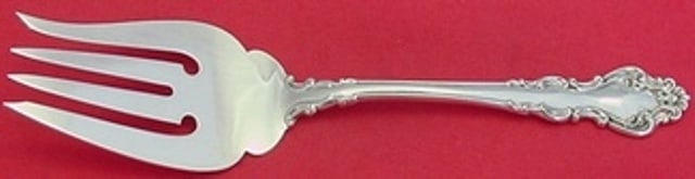 Sterling Silver Serving Fork Reed Barton Spanish Baroque 8 1/2": Sterling Silver Serving Fork Reed Barton Spanish Baroque 8 1/2" A Reed & Barton Spanish Baroque sterling silver cold meat fork with an ornate handle design and three tines. It dates to the post-1940 p