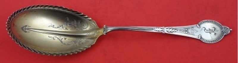 Sterling Silver Berry Spoon Comstock Pattern with Pie Crust Edge 9.5 Inch: Sterling Silver Berry Spoon Comstock Pattern with Pie Crust Edge 9.5 Inch This is a sterling silver berry spoon in the Comstock pattern by Vanderslice. The spoon features a gold washed bright-cut bowl