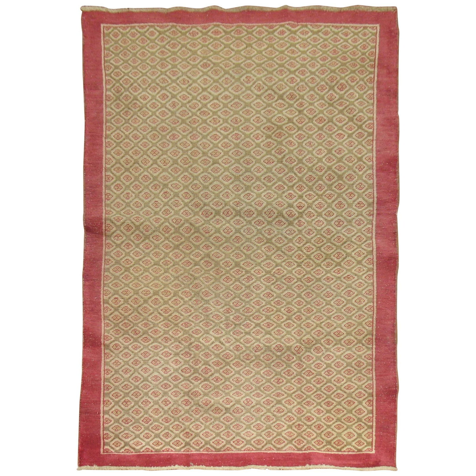 Mid Century Modern Wool Hand Knotted Turkish Rug 4'1 x 6'7: Mid Century Modern Wool Hand Knotted Turkish Rug 4'1 x 6'7 This vintage Turkish carpet features a tight, repetitive pattern in raspberry tones set against a camel brown field, exemplifying mid-century
