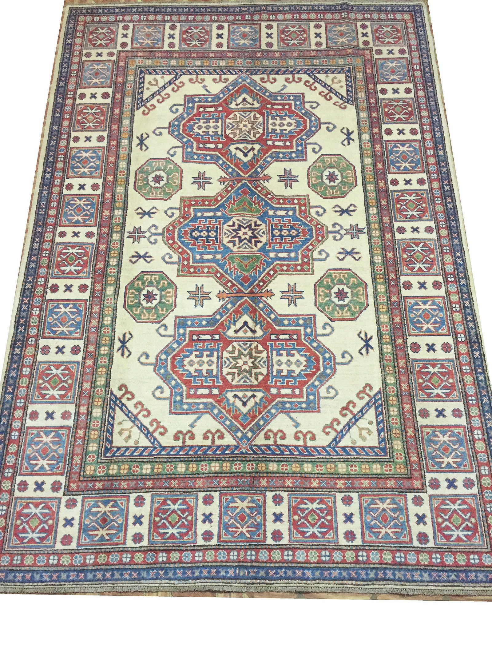 Handmade Kazak Rug 6.1 x 9 Ivory Geometric Wool Area Rug: Handmade Kazak Rug 6.1 x 9 Ivory Geometric Wool Area Rug Free continental US Shipping Discover the exquisite 6' x 9' Handmade Kazak Rug featuring a captivating ivory geometric design that beautifully 