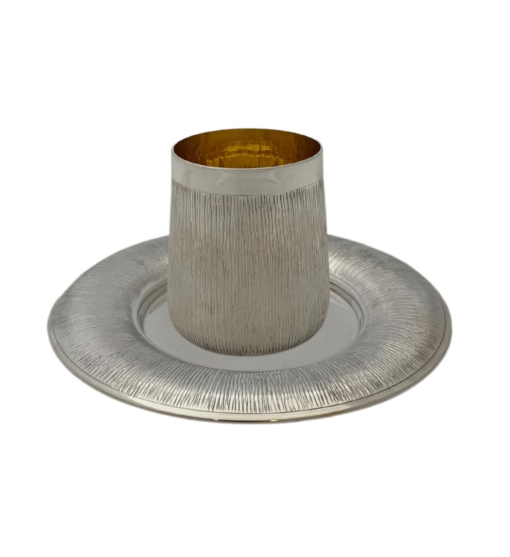Italian 925 Sterling Silver Handmade Cup and Tray Set: Italian 925 Sterling Silver Handmade Cup and Tray Set This fine cup and tray set is crafted from 925 sterling silver and features handmade modern striated and sleek designs. The set originates from It