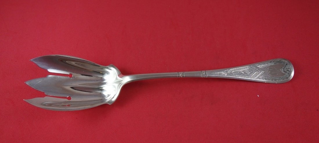 Tiffany & Co King William Engraved Sterling Silver Salad Serving Fork 10.5": Tiffany & Co King William Engraved Sterling Silver Salad Serving Fork 10.5" This exquisite salad serving fork is crafted from high-quality sterling silver by the renowned Tiffany & Co. It features the