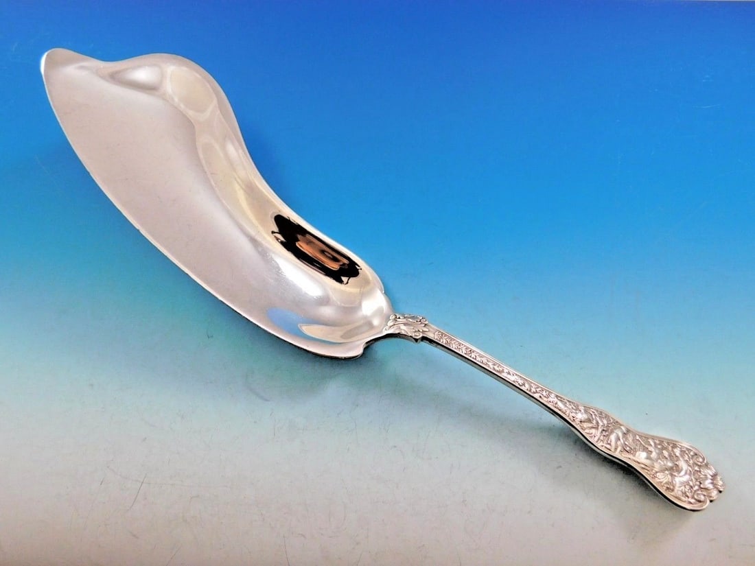 Tiffany & Co Olympian Sterling Silver Fish Server 12 1/8" Monogrammed: Tiffany & Co Olympian Sterling Silver Fish Server 12 1/8" Monogrammed This exquisite fish server from the renowned Olympian pattern by Tiffany & Co. is crafted from high-quality sterling silver. Measu