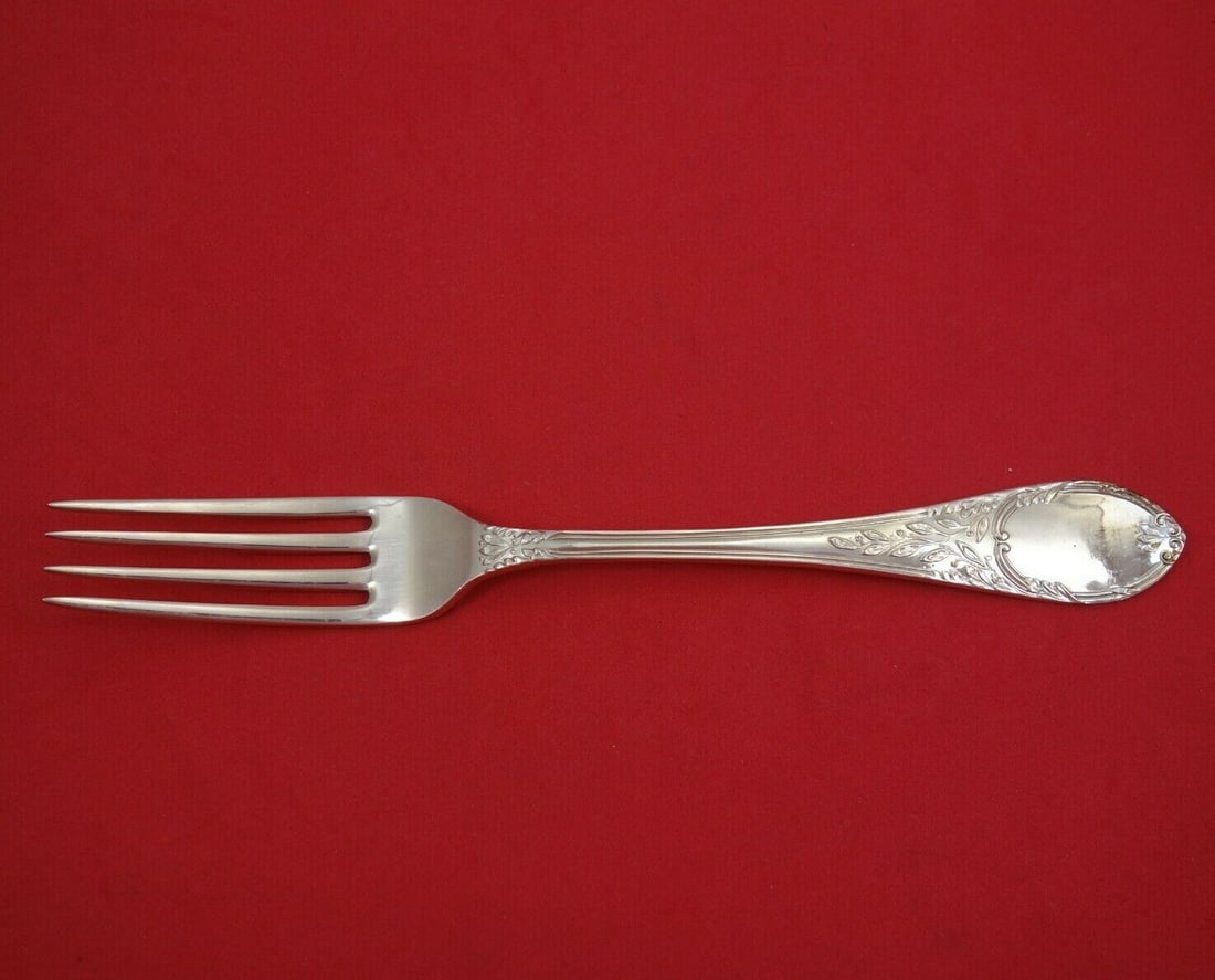 Mappin & Webb Laurel and Ribbon Sterling Silver Dinner Fork 8.5": Mappin & Webb Laurel and Ribbon Sterling Silver Dinner Fork 8.5" This exquisite dinner fork from Mappin & Webb features the elegant "Laurel and Ribbon" pattern, crafted from high-quality sterling silv