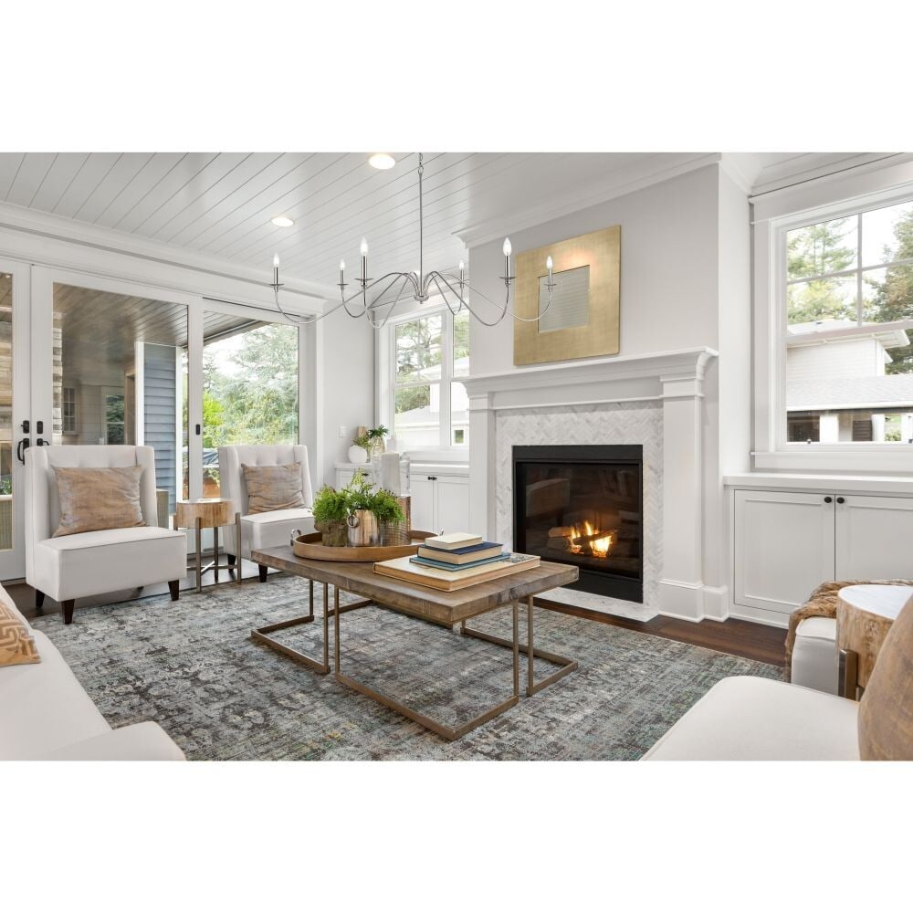 Rohan 6-Light Polished Nickel Chandelier by Living District 60 Inch Adjustable Fixture: Rohan 6-Light Polished Nickel Chandelier by Living District 60 Inch Adjustable Fixture This large chandelier features a polished nickel metal frame with a modern design, suitable for dining rooms, foy