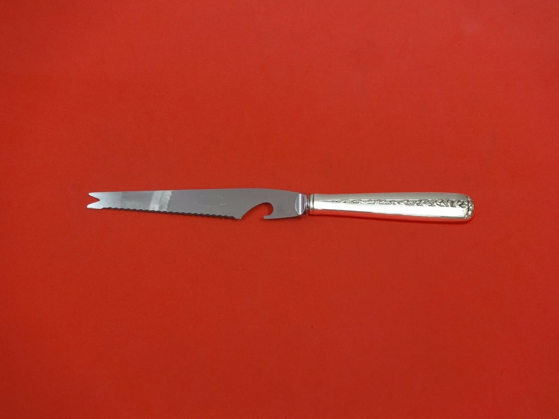 Towle Rambler Rose Sterling Silver Custom Bar Knife 9 1/8": Towle Rambler Rose Sterling Silver Custom Bar Knife 9 1/8" This exquisite Rambler Rose Bar Knife showcases the timeless elegance of the Towle Sterling Silver pattern. Crafted with a hollow handle and 