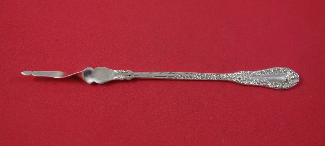 Dominick & Haff Number 10 Sterling Silver Butter Pick Twisted 6 Inch Serving Piece: Dominick & Haff Number 10 Sterling Silver Butter Pick Twisted 6 Inch Serving Piece Indulge in the elegance of this Number 10 Butter Pick by Dominick & Haff. Crafted from high-quality sterling silver, 
