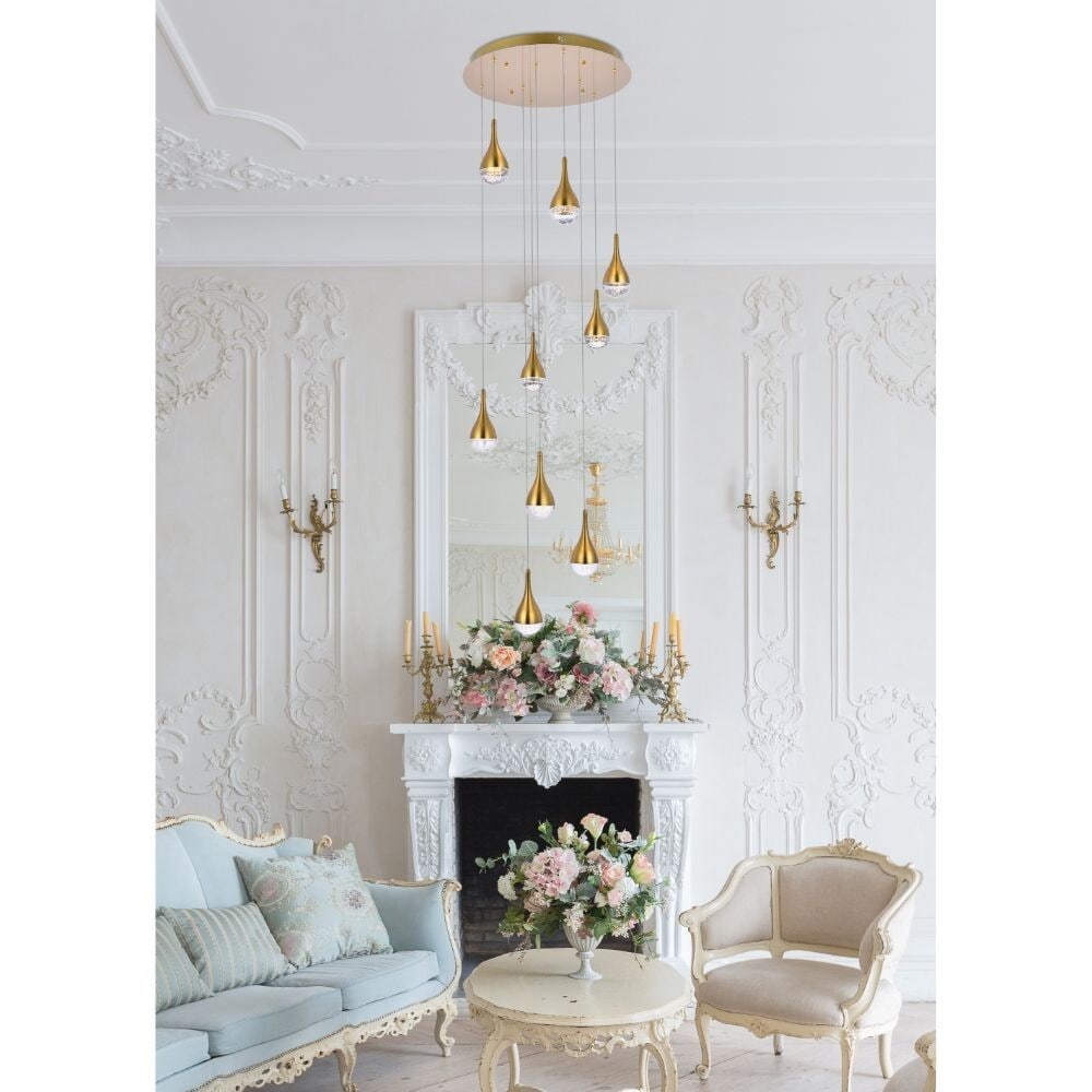 Amherst 9 Light Satin Gold Crystal Glass Pendant: Amherst 9 Light Satin Gold Crystal Glass Pendant Modern 9-light pendant chandelier in a satin gold finish with clear glass and crystal materials. It is hardwired, intended for indoor installation, and