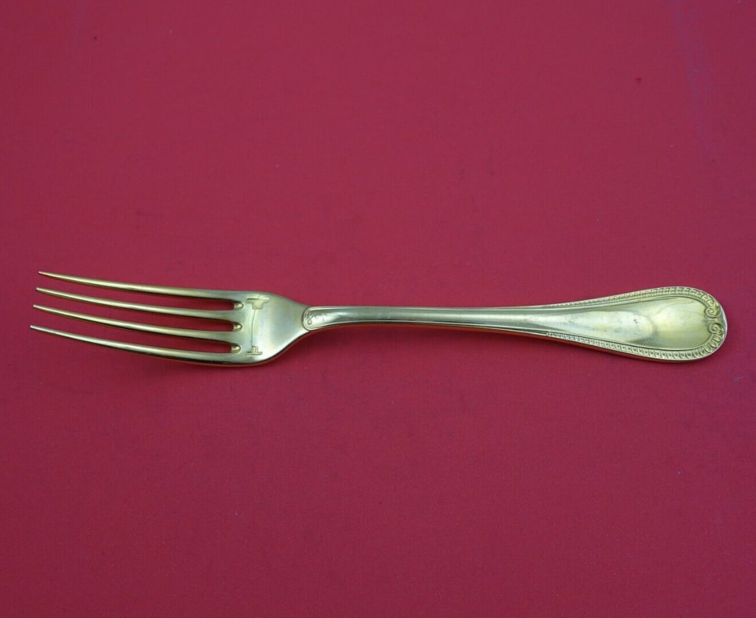 Christofle Malmaison Vermeil Silverplate Dinner Fork 8 Inch: Christofle Malmaison Vermeil Silverplate Dinner Fork 8 Inch Elevate your dining experience with this exquisite Malmaison Vermeil dinner fork by Christofle. Crafted from quality silverplate, this 8-inc